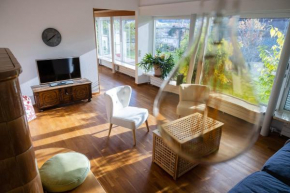 Beautiful luxury apartment with terrace, large garden, parking space and smart TV